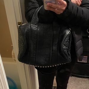 Alexanderwang , Creations like this Rocco bag  never go out of style.